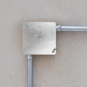 Flat blank cover installed on a 4-inch square electrical box