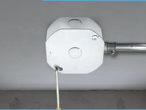 4-inch octagon electrical box with flush cover installed